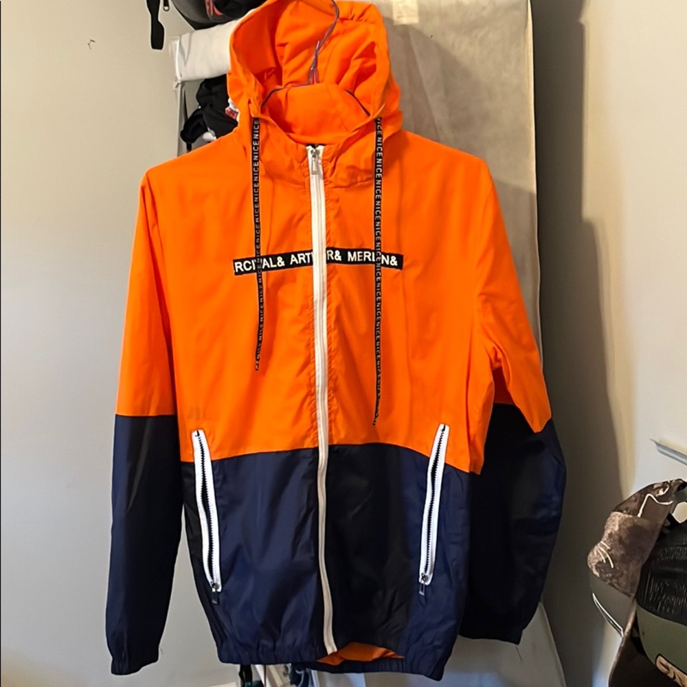 Blue and orange rain jacket